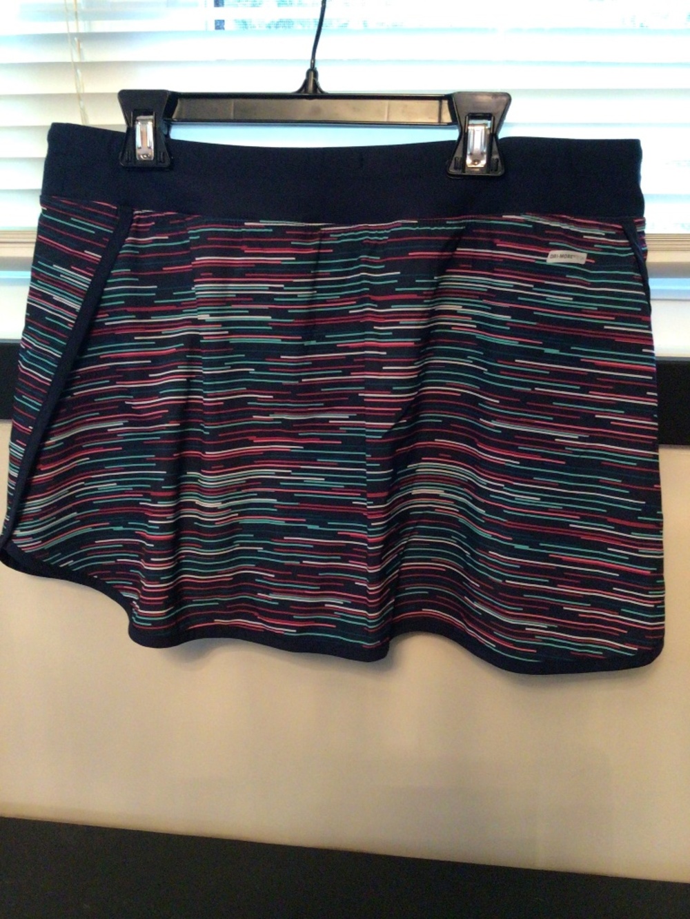 Women’s size large multi coloured skort in pre-loved new like condition